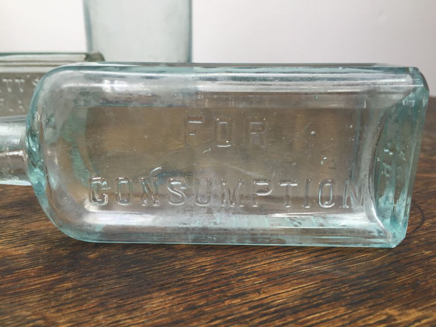 Collectible Clear Glass Advertising Bottles [Photo 6]