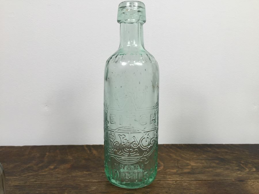 Collectible Clear Glass Advertising Bottles [Photo 11]