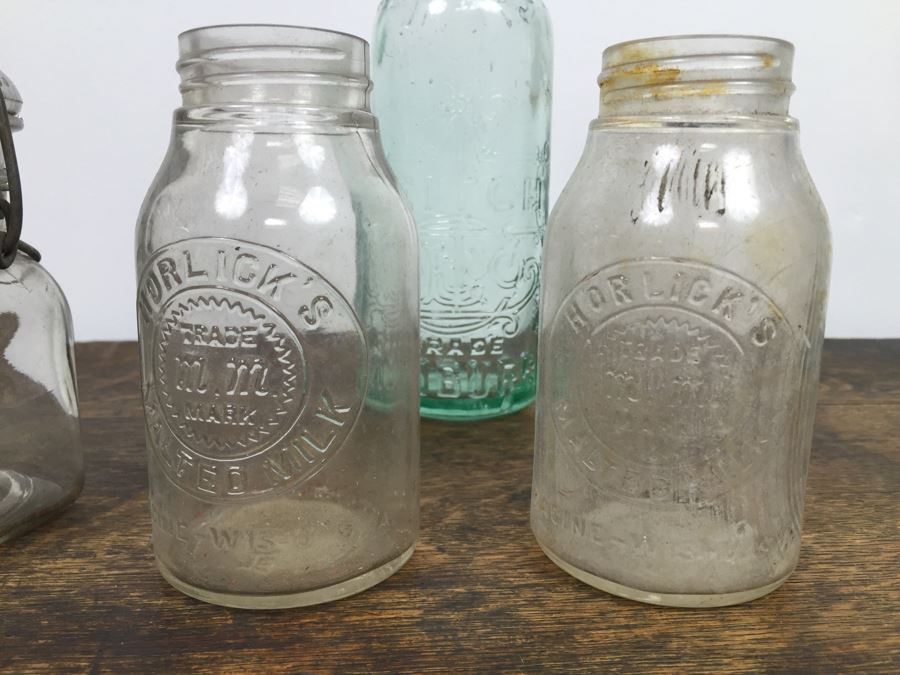 Collectible Clear Glass Advertising Bottles [Photo 3]