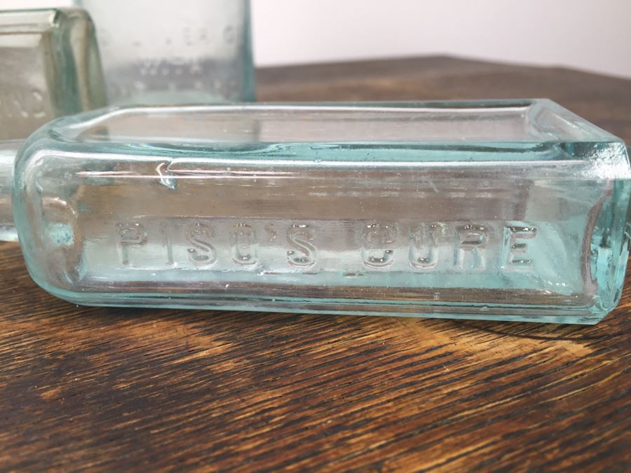 Collectible Clear Glass Advertising Bottles [Photo 4]
