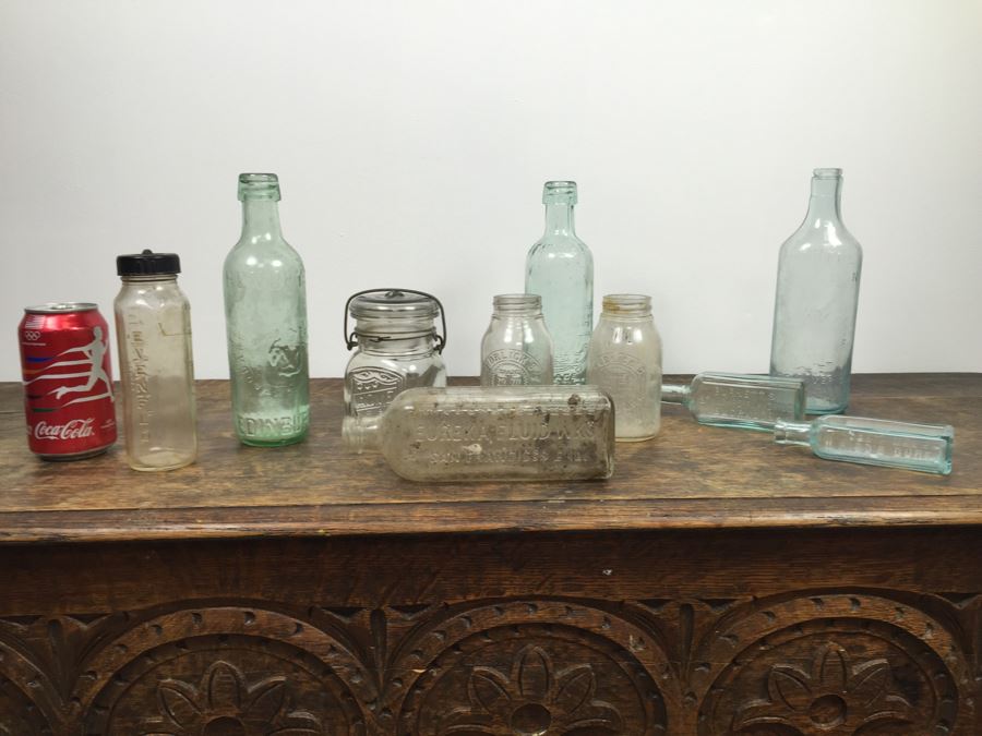 Collectible Clear Glass Advertising Bottles