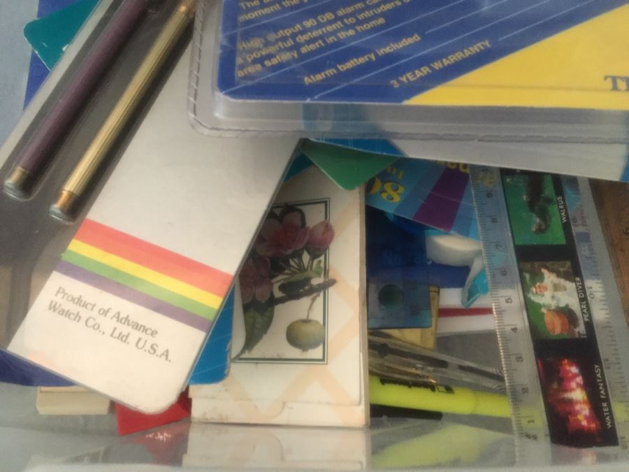 Rolling Plastic Storage Bin Filled With Office Supplies Including Pens [Photo 12]