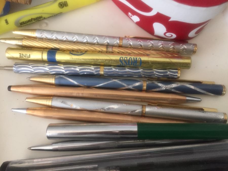 Rolling Plastic Storage Bin Filled With Office Supplies Including Pens [Photo 5]