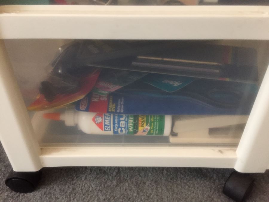 Rolling Plastic Storage Bin Filled With Office Supplies Including Pens [Photo 16]