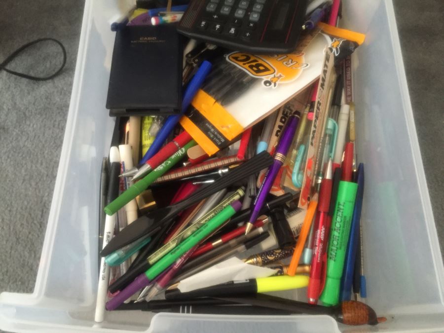 Rolling Plastic Storage Bin Filled With Office Supplies Including Pens [Photo 3]