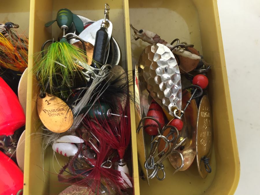 Plano Double-Sided Tackle Box Filled With Fishing Flies And Fishing Lures