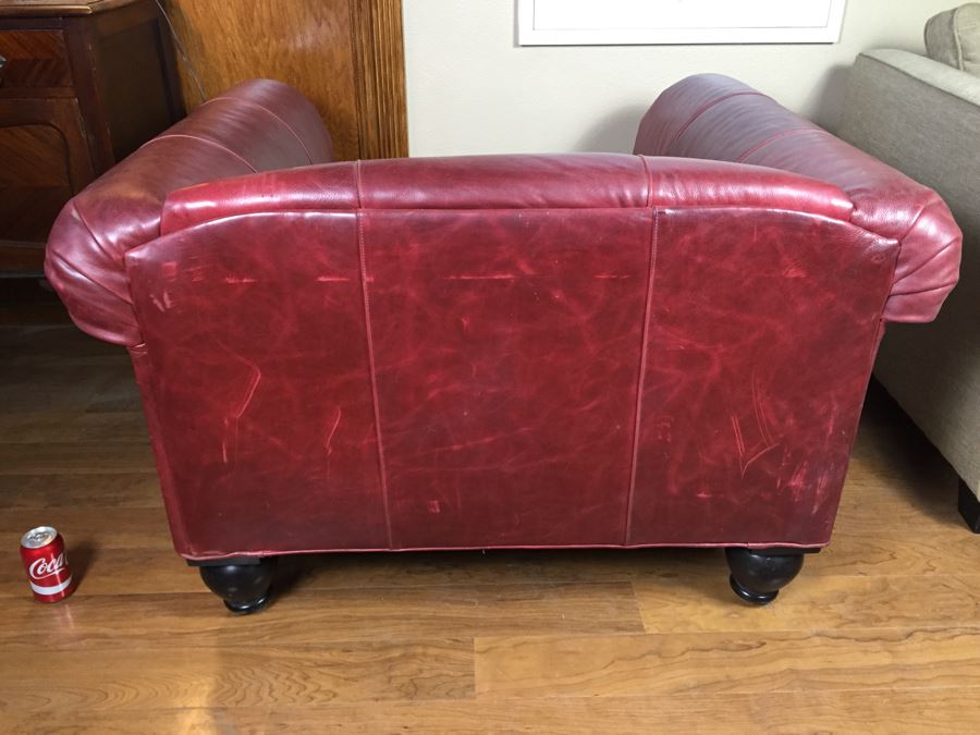 Burgundy Leather Armchair With Leather Throw Pillows [Photo 11]
