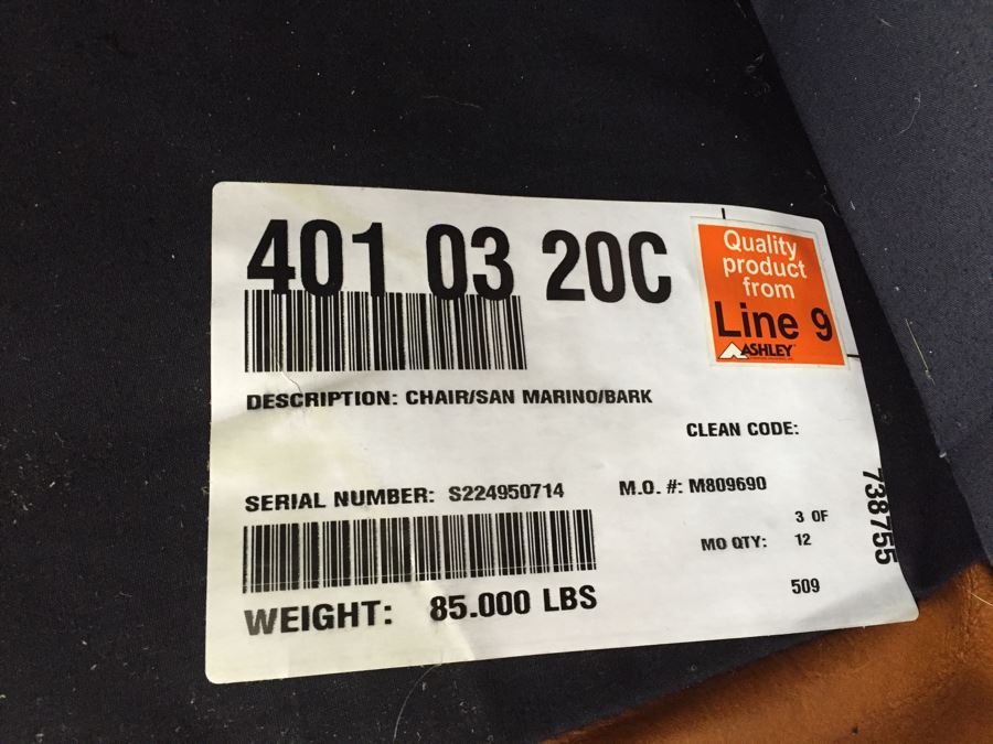 Ashley Furniture Comfortable Light Brown Leather Armchair [Photo 9]