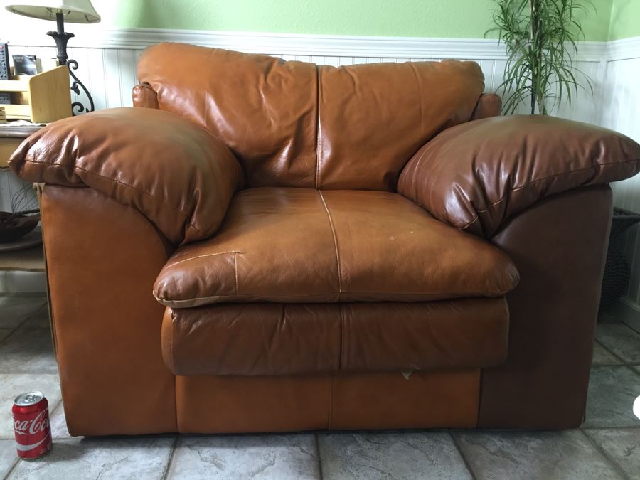 Ashley Furniture Comfortable Light Brown Leather Armchair [Photo 1]