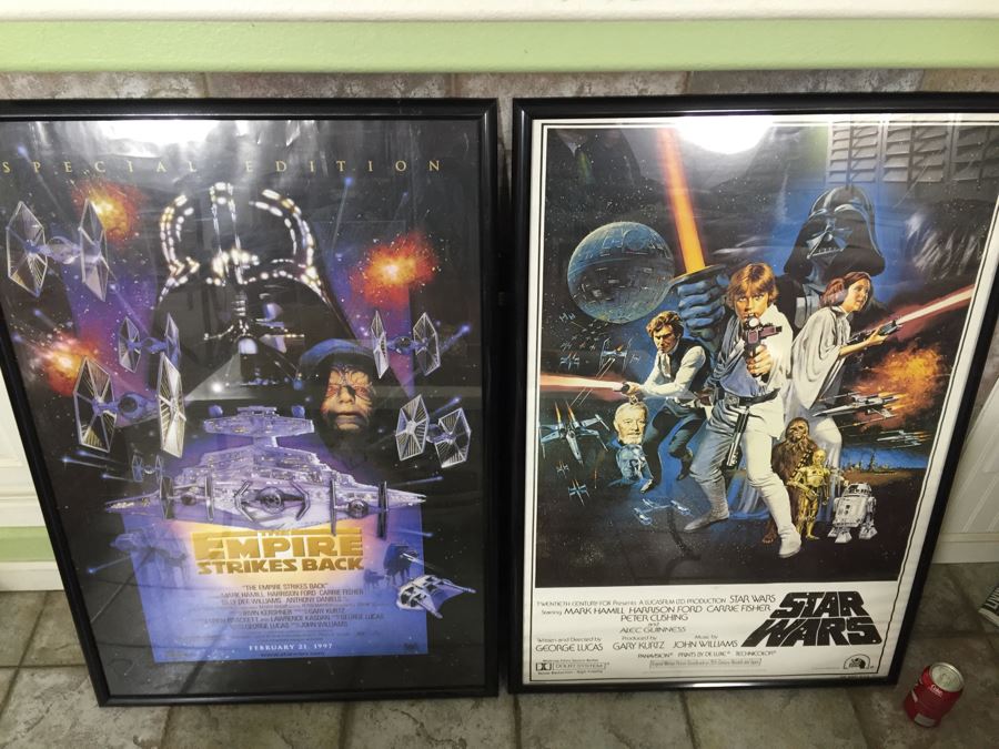 Pair Of Reproduction Framed Star Wars And The Empire Strikes Back Movie Posters