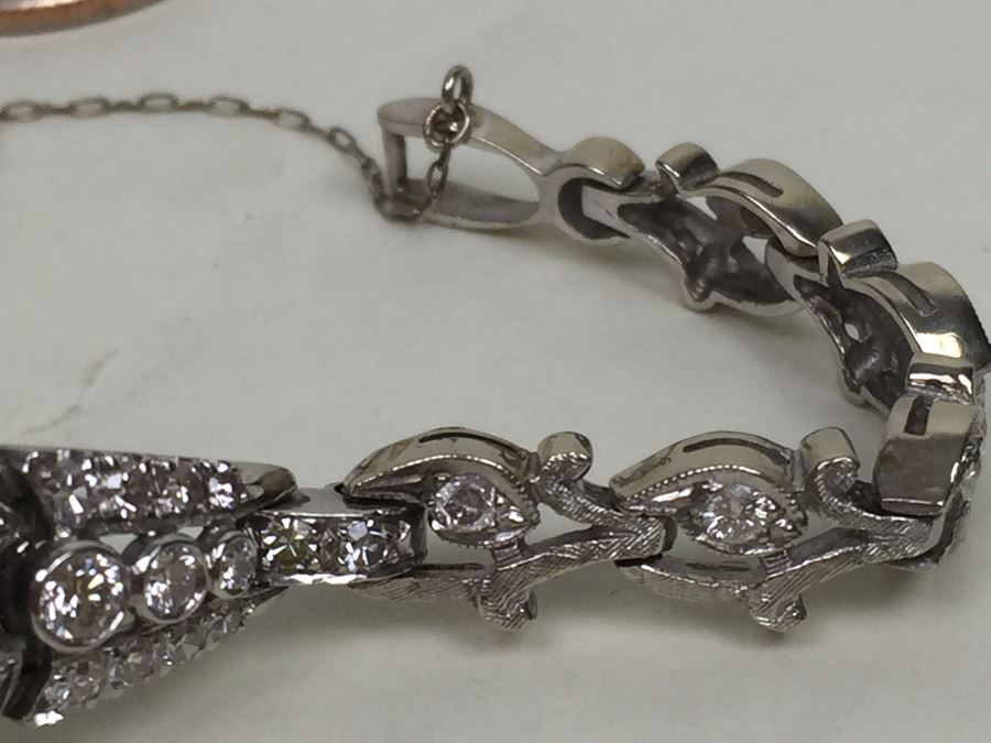 Spectacular Women's Hamilton Platinum Watch Covered In Diamonds With 14K Gold Watch Band Covered In Diamonds Estimate $3,000-$5,000 [Photo 11]