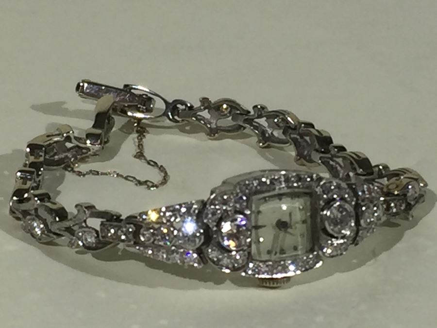 Spectacular Women's Hamilton Platinum Watch Covered In Diamonds With 14K Gold Watch Band Covered In Diamonds Estimate $3,000-$5,000 [Photo 44]