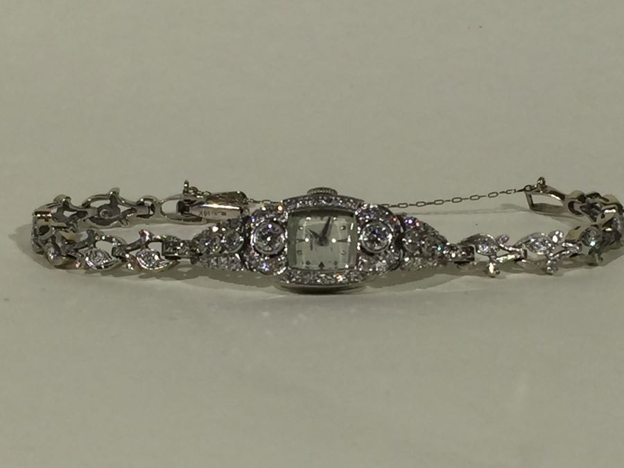 Spectacular Women's Hamilton Platinum Watch Covered In Diamonds With 14K Gold Watch Band Covered In Diamonds Estimate $3,000-$5,000 [Photo 68]