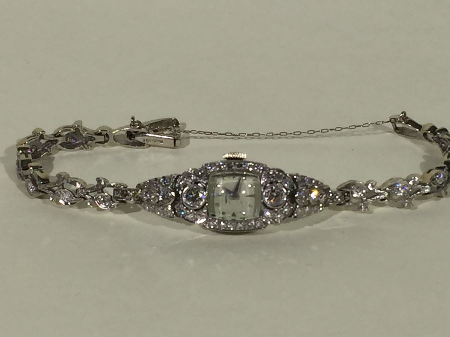 Spectacular Women's Hamilton Platinum Watch Covered In Diamonds With 14K Gold Watch Band Covered In Diamonds Estimate $3,000-$5,000 [Photo 64]