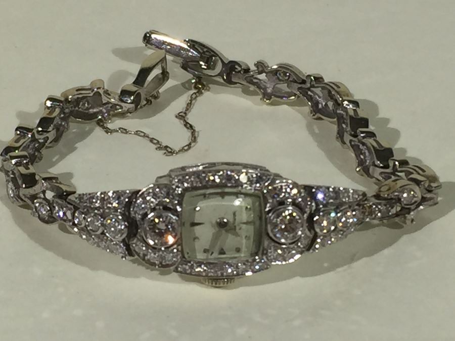 Spectacular Women's Hamilton Platinum Watch Covered In Diamonds With 14K Gold Watch Band Covered In Diamonds Estimate $3,000-$5,000 [Photo 29]