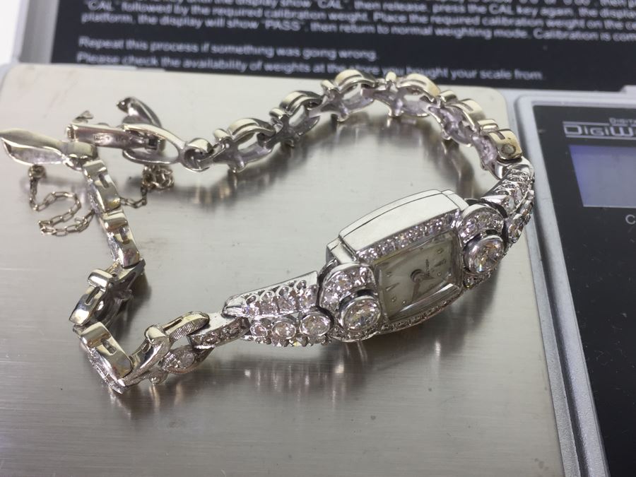 Spectacular Women's Hamilton Platinum Watch Covered In Diamonds With 14K Gold Watch Band Covered In Diamonds Estimate $3,000-$5,000 [Photo 71]