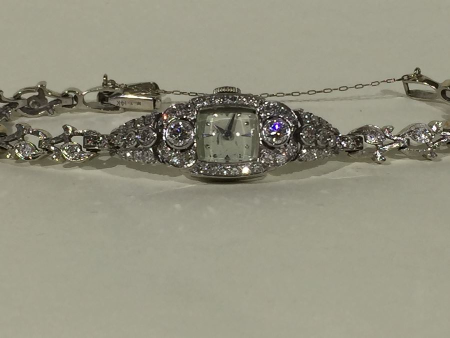 Spectacular Women's Hamilton Platinum Watch Covered In Diamonds With 14K Gold Watch Band Covered In Diamonds Estimate $3,000-$5,000 [Photo 67]