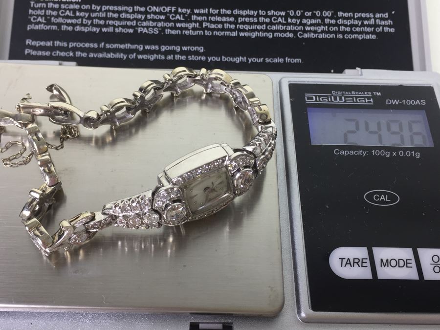 Spectacular Women's Hamilton Platinum Watch Covered In Diamonds With 14K Gold Watch Band Covered In Diamonds Estimate $3,000-$5,000 [Photo 3]