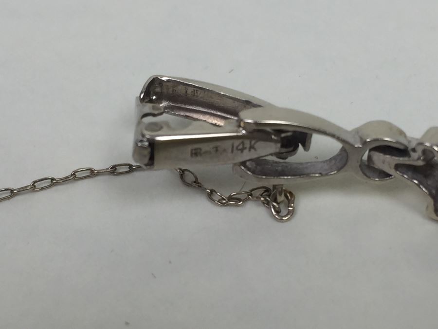 Spectacular Women's Hamilton Platinum Watch Covered In Diamonds With 14K Gold Watch Band Covered In Diamonds Estimate $3,000-$5,000 [Photo 17]