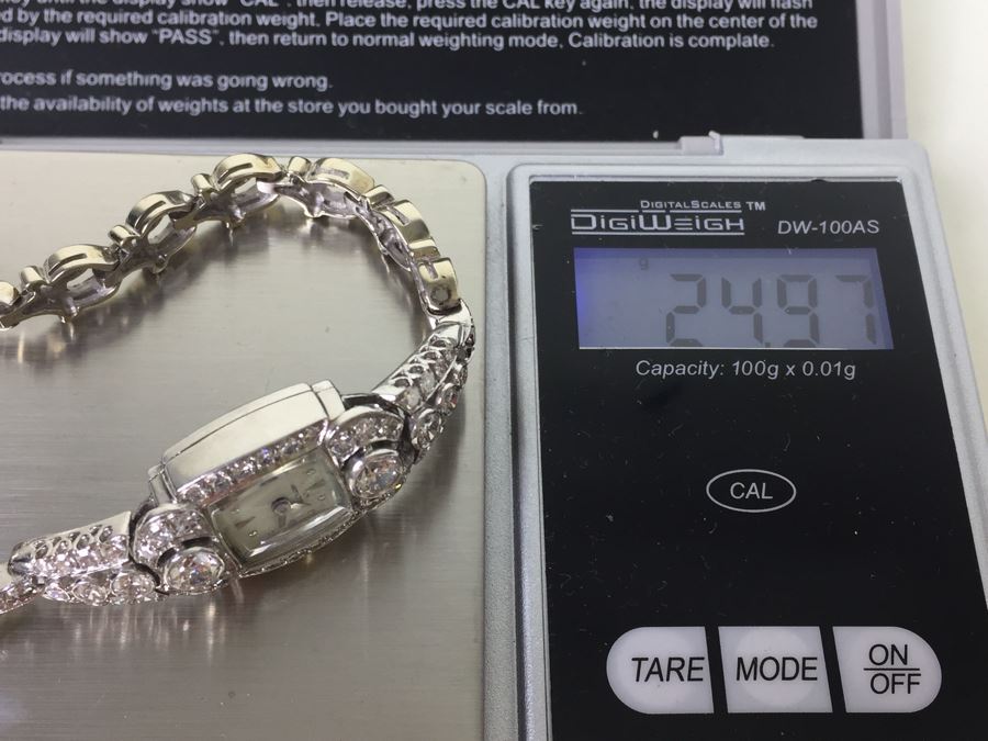 Spectacular Women's Hamilton Platinum Watch Covered In Diamonds With 14K Gold Watch Band Covered In Diamonds Estimate $3,000-$5,000 [Photo 72]