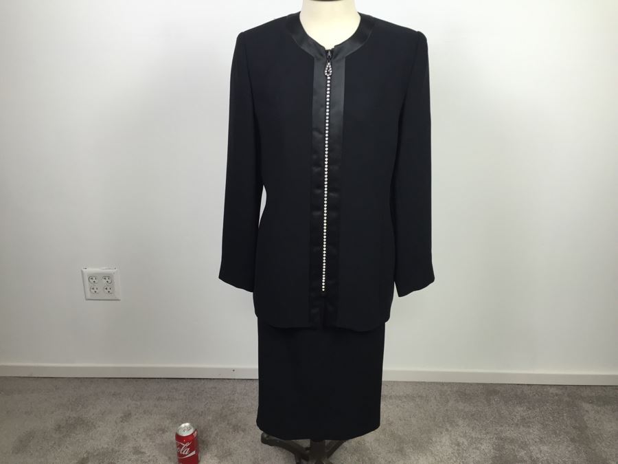 Women's Black Jacket And Skirt Outfit [Photo 1]