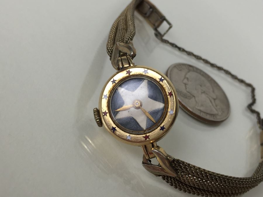 14K Gold Custom Cartier Watch With Inlaid Stars Marking Hours [Photo 1]