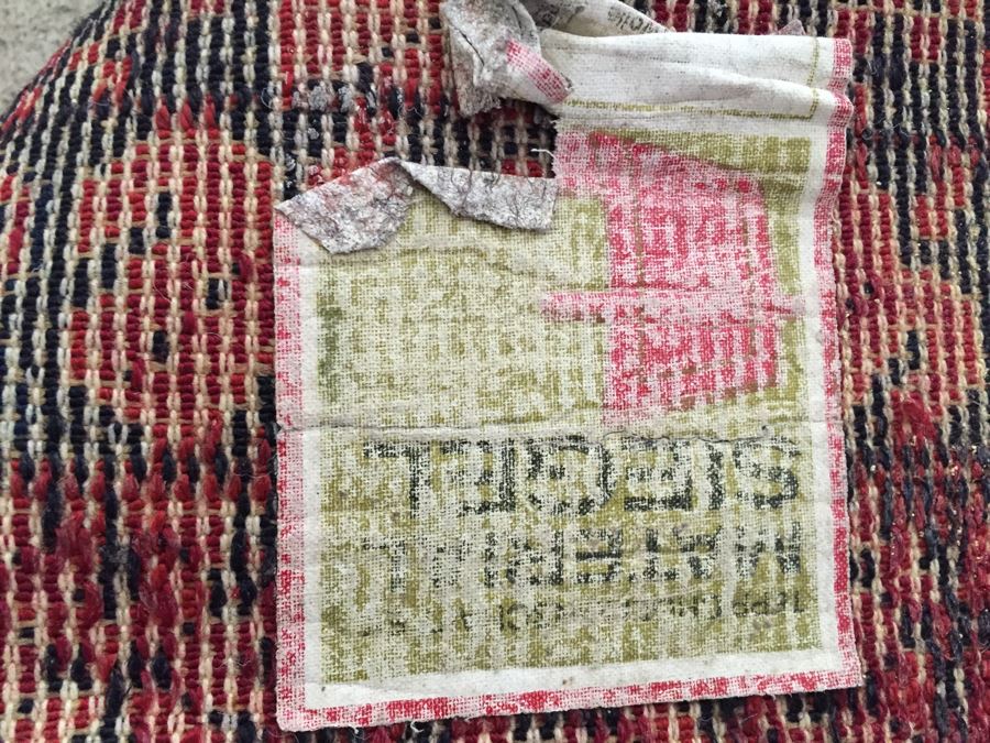 Red And Black Rug With Geometric Patterns [Photo 3]