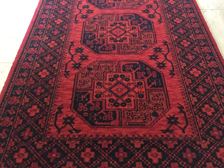 Red And Black Rug With Geometric Patterns [Photo 2]