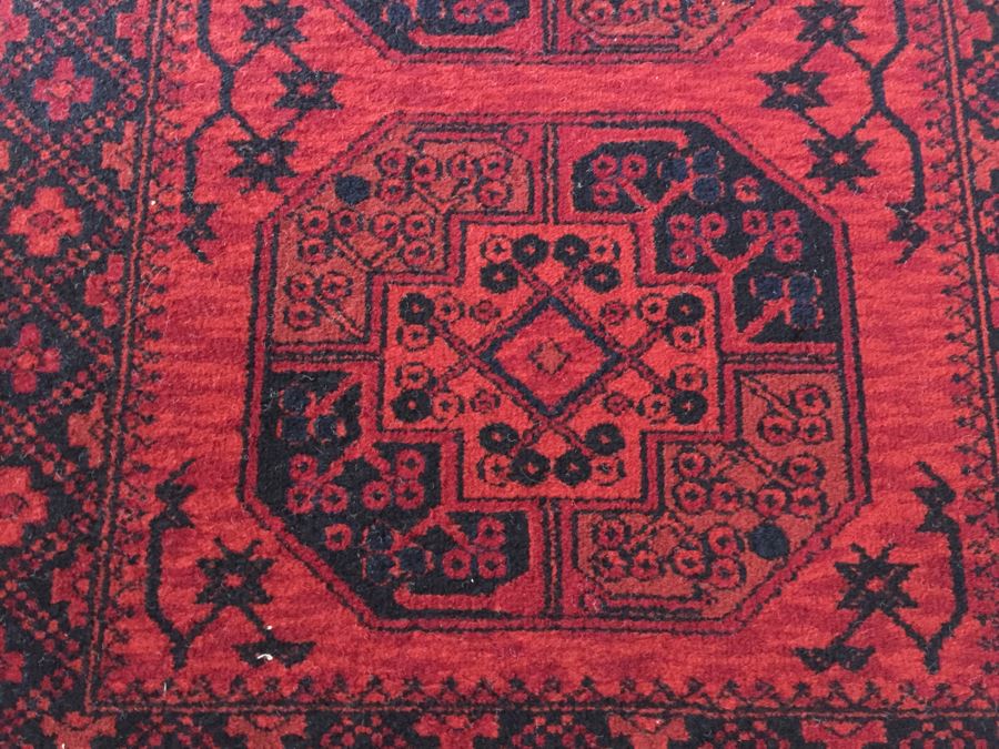 Red And Black Rug With Geometric Patterns [Photo 6]