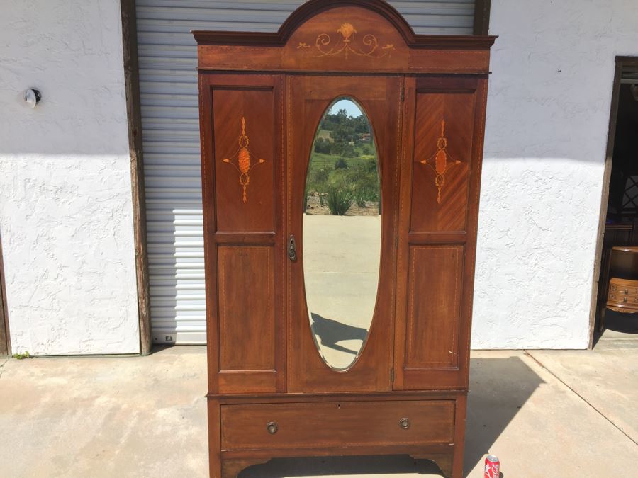 Stunning Antique Armoire Closet With Drawer And Nice Inlay Work Througout Beveled Oval Mirror [Photo 1]