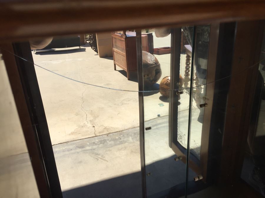 Mirrored Curio Cabinet With Detailed Wood Carving And Marble Top [Photo 19]