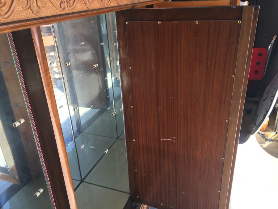 Mirrored Curio Cabinet With Detailed Wood Carving And Marble Top [Photo 18]