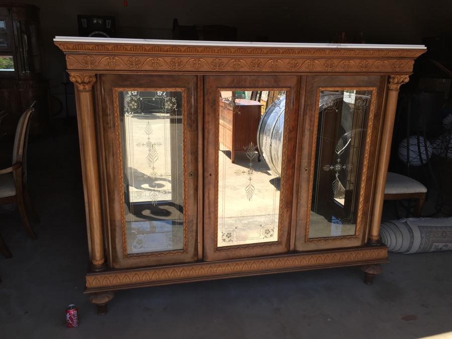 Mirrored Curio Cabinet With Detailed Wood Carving And Marble Top