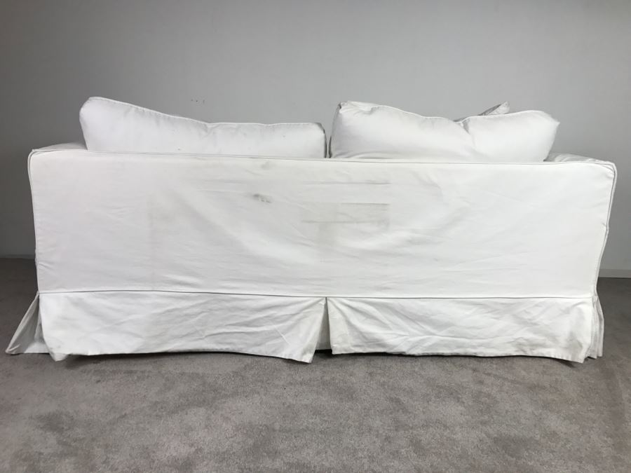 Sofa Sleeper With White Slip Cover [Photo 9]