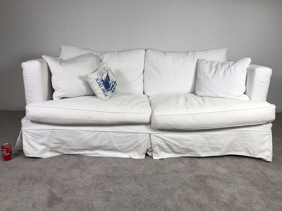 Sofa Sleeper With White Slip Cover [Photo 2]