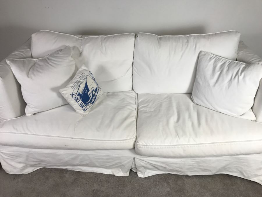 Sofa Sleeper With White Slip Cover [Photo 3]