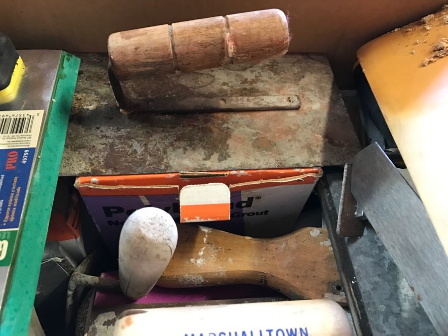 Box Filled With Tile Cement Tools [Photo 5]