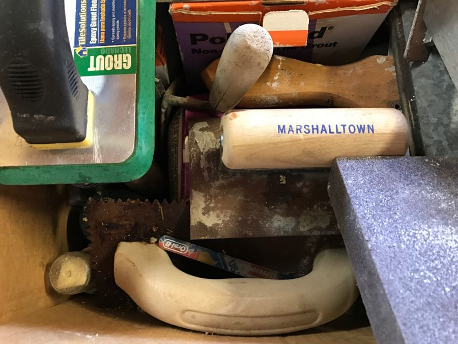 Box Filled With Tile Cement Tools [Photo 3]