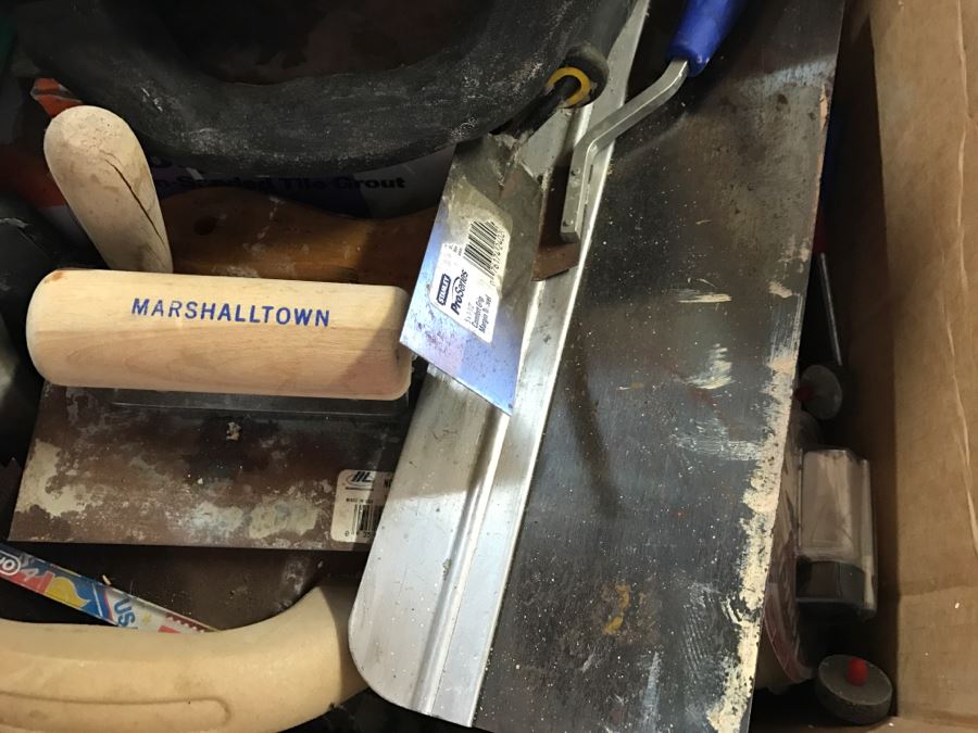 Box Filled With Tile Cement Tools [Photo 8]