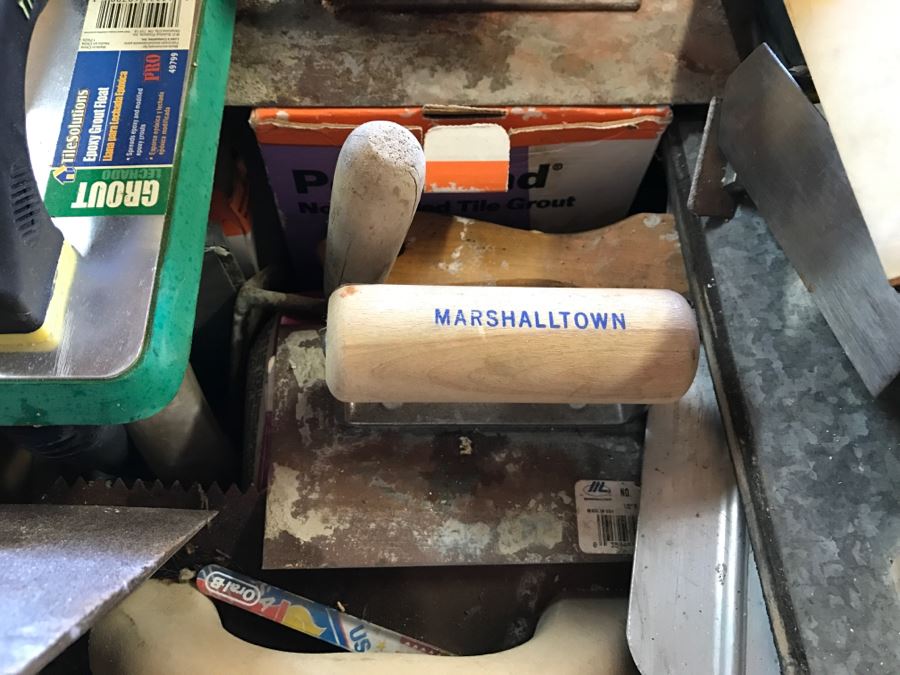 Box Filled With Tile Cement Tools [Photo 4]