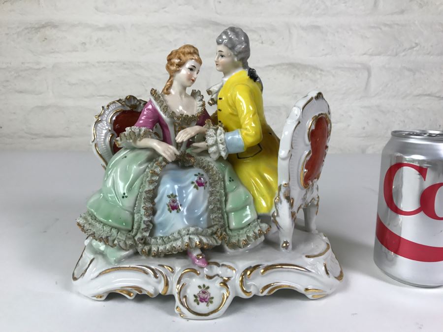 Hand Painted Figurine Of Man And Woman Embracing On Chairs [Photo 2]