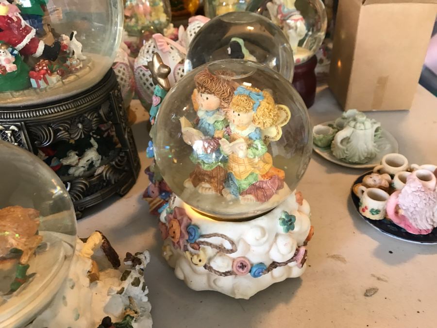 Huge Snow Globe Collection Mainly Holiday Themed Plus Decorations Featured On Table [Photo 8]
