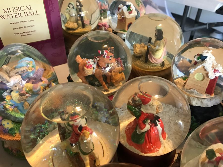 Huge Snow Globe Collection Mainly Holiday Themed Plus Decorations Featured On Table [Photo 16]