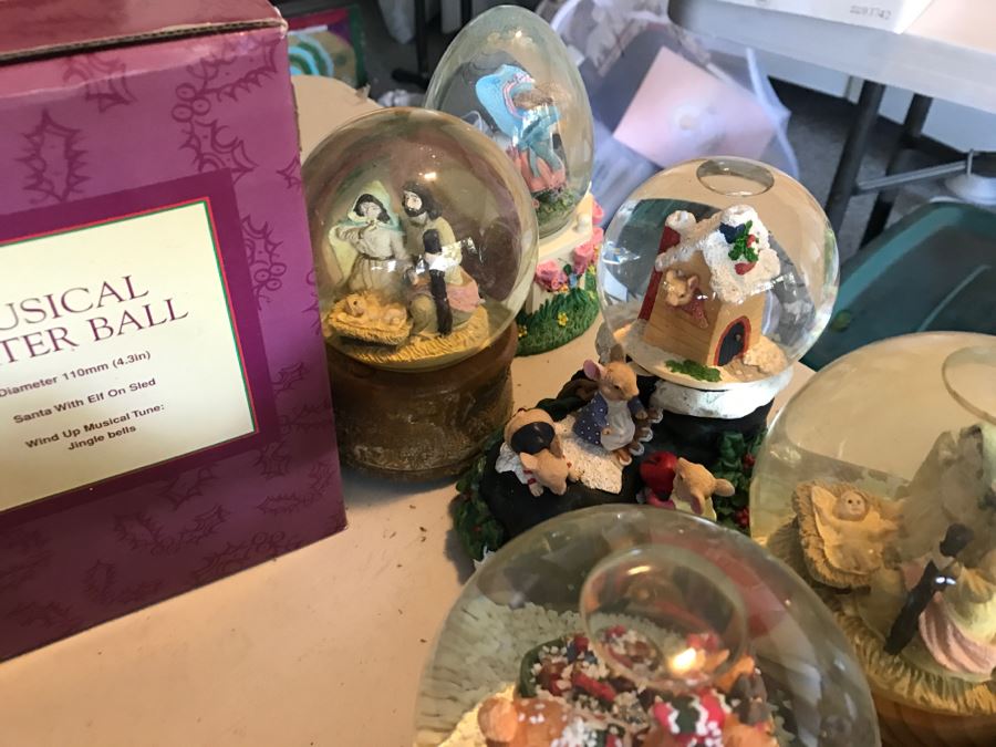 Huge Snow Globe Collection Mainly Holiday Themed Plus Decorations Featured On Table [Photo 17]