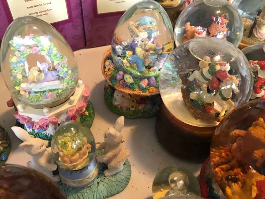 Huge Snow Globe Collection Mainly Holiday Themed Plus Decorations Featured On Table [Photo 18]