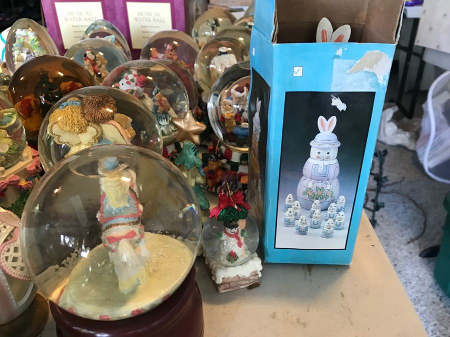 Huge Snow Globe Collection Mainly Holiday Themed Plus Decorations Featured On Table [Photo 12]
