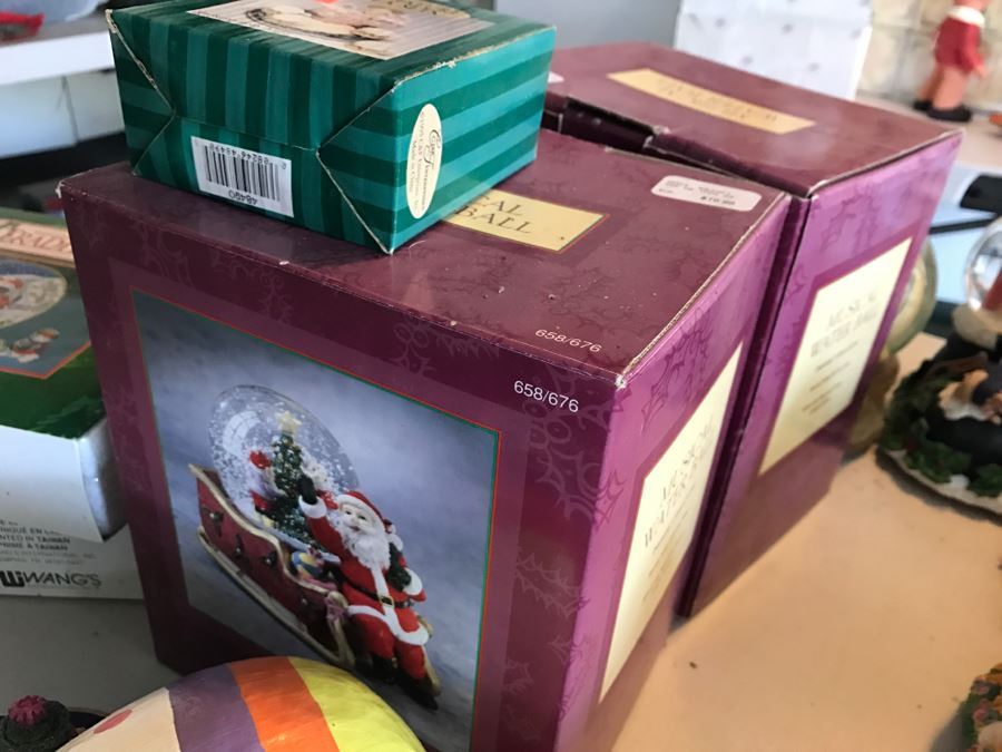 Huge Snow Globe Collection Mainly Holiday Themed Plus Decorations Featured On Table [Photo 22]