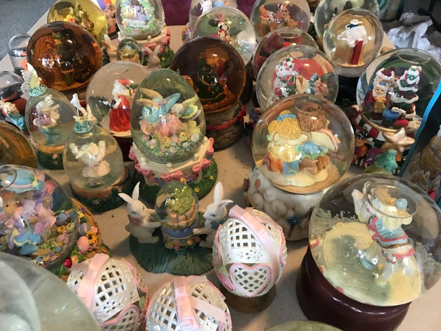 Huge Snow Globe Collection Mainly Holiday Themed Plus Decorations Featured On Table [Photo 14]