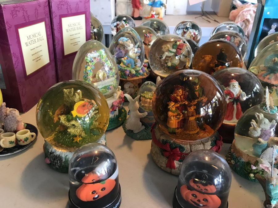 Huge Snow Globe Collection Mainly Holiday Themed Plus Decorations Featured On Table [Photo 20]