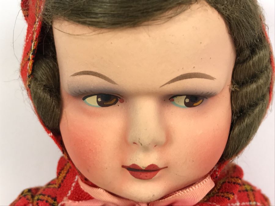 big face doll